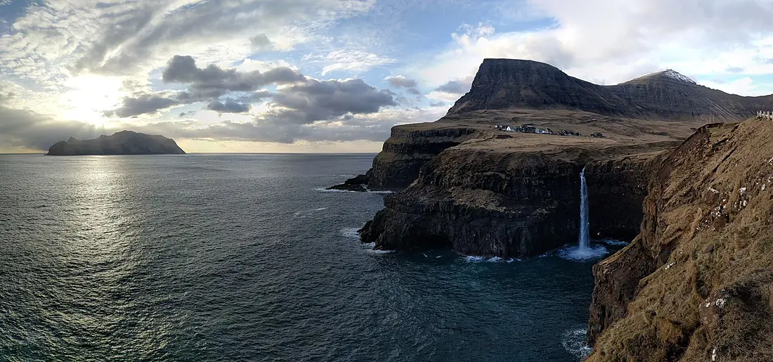 Gasadalur village and a waterfall