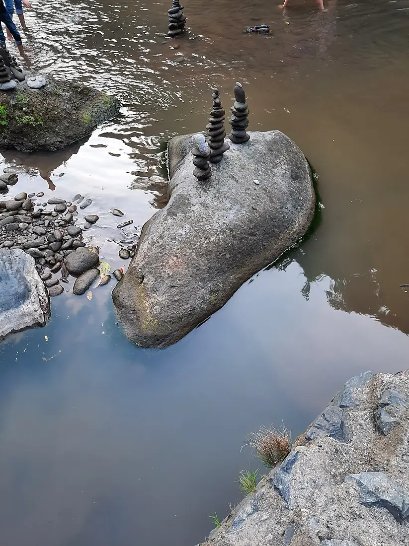 Tegenungan Glasinga Waterfall Stone Balance